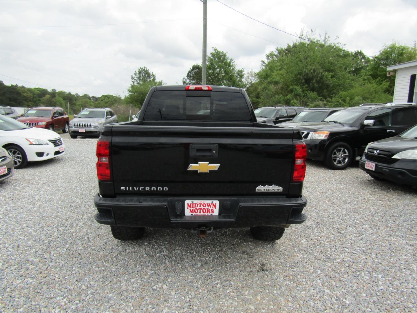 2015 Black Chevrolet Silverado 1500 High Country Crew Cab 4WD (3GCUKTEJ9FG) with an 6.2L V8 OHV 16V engine, Automatic transmission, located at 15016 S Hwy 231, Midland City, AL, 36350, (334) 983-3001, 31.306210, -85.495277 - Photo#6